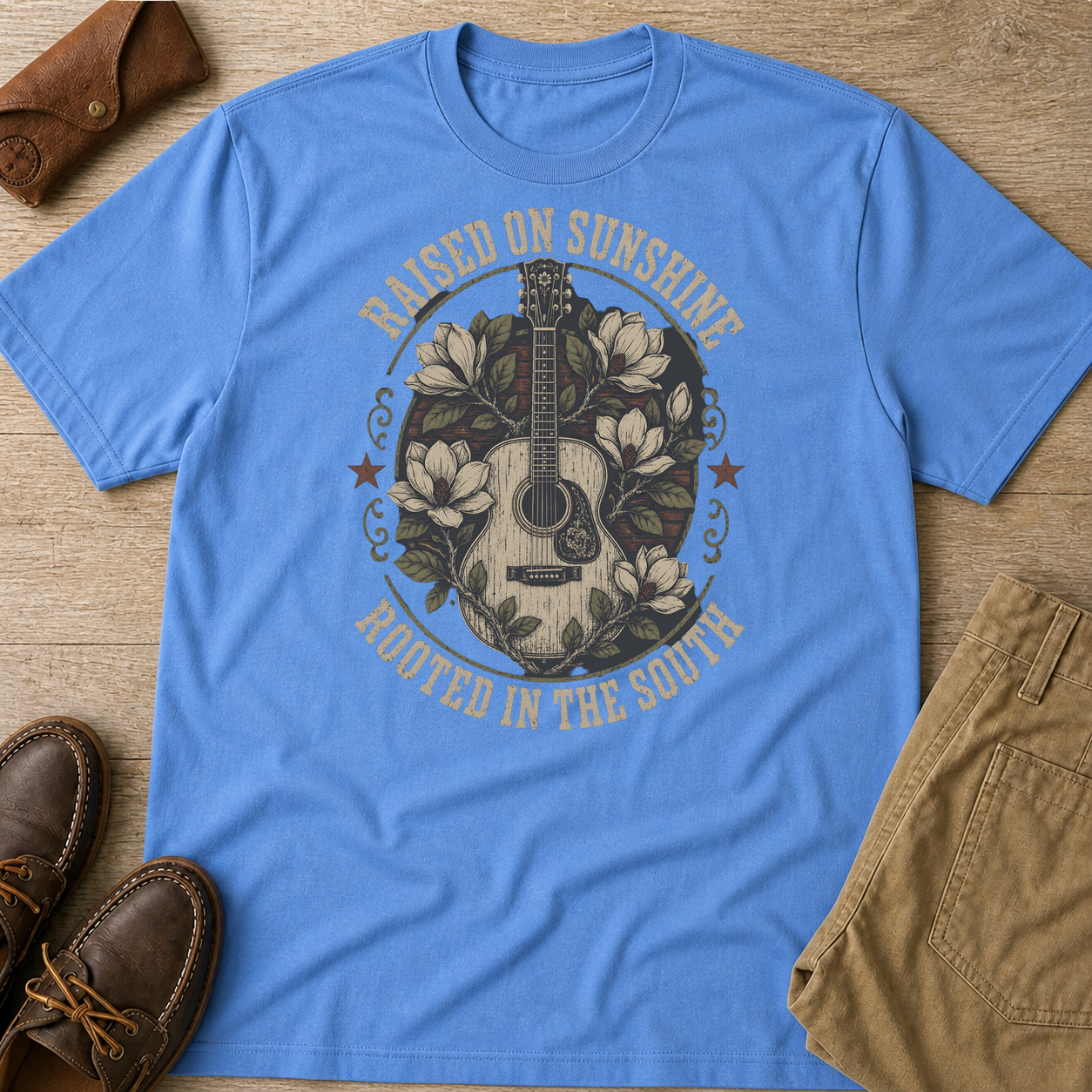 Raised On Sunshine Rooted In The South T-Shirt Carolina Blue t-shirt flat lay mockup