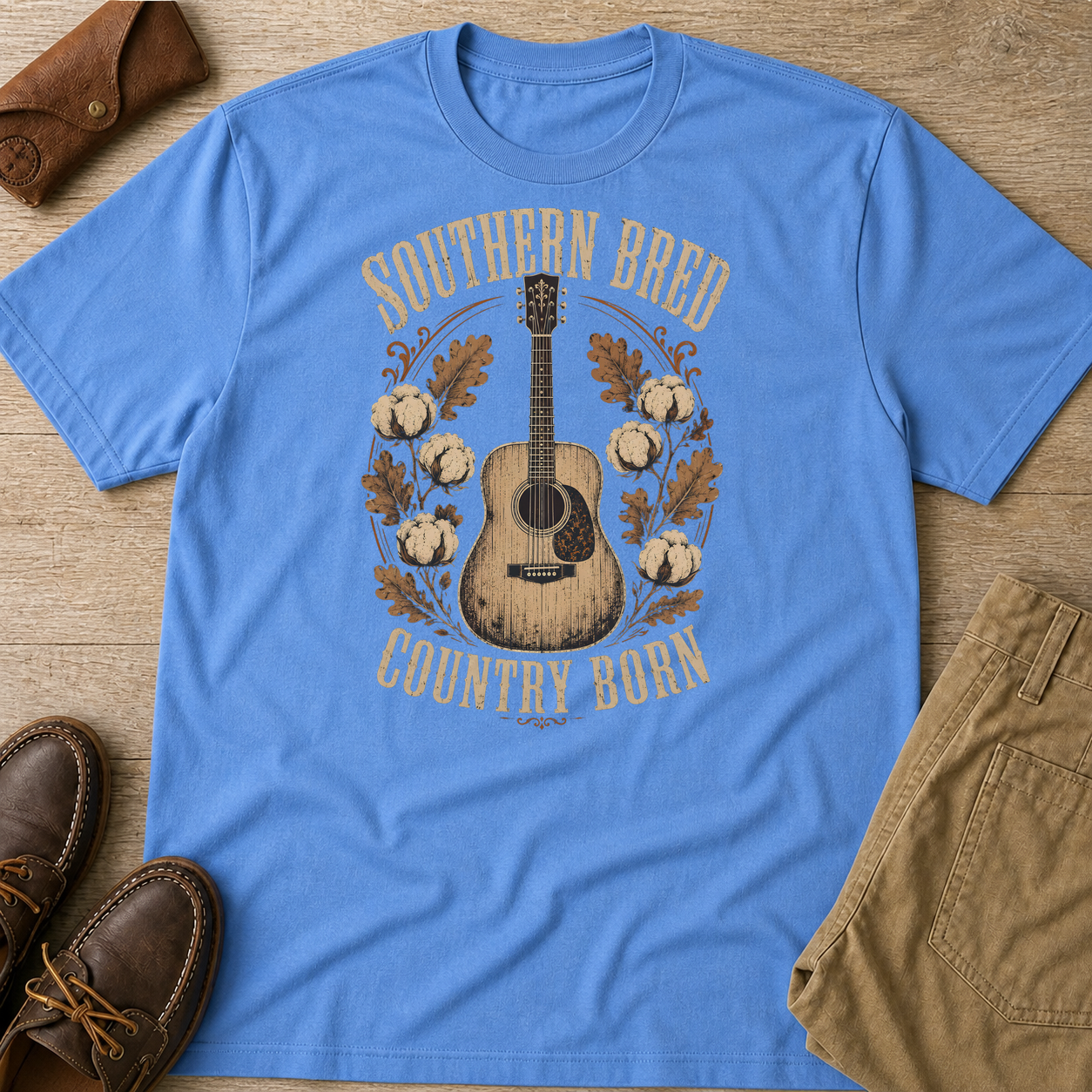 Southern Bred Country Born Vintage Guitar T-Shirt Carolina Blue t-shirt flat lay mockup