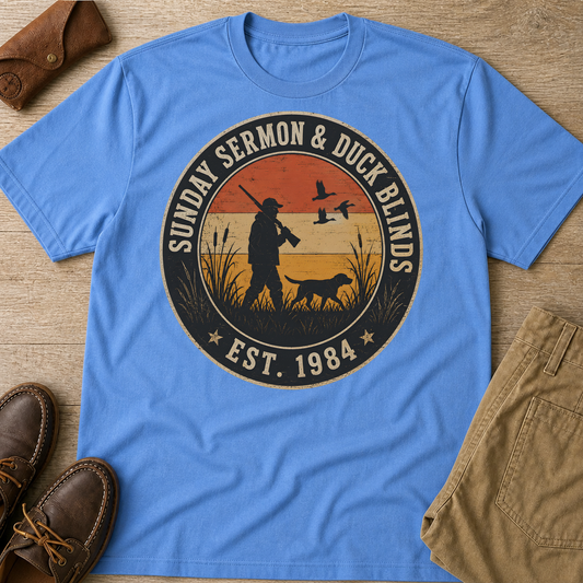 Sunday Sermon And Duck Blinds Est 1984 T-Shirt Carolina Blue t-shirt flat lay mockup