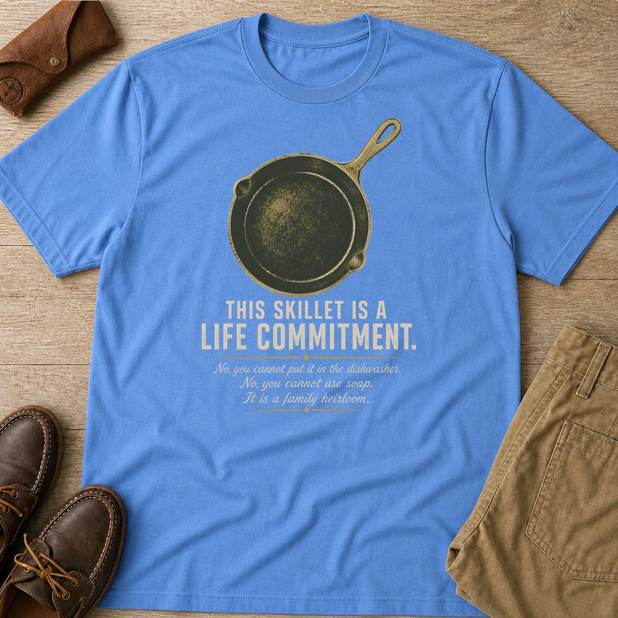 This Skillet Is A Life Commitment Family Heirloom T-Shirt Carolina Blue t-shirt flat lay mockup